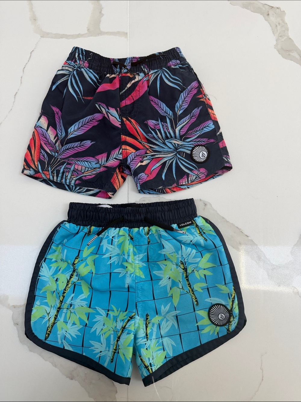 Volcom Kids Dual-Pair Tropical Swim Shorts in Black, Blue & Pink